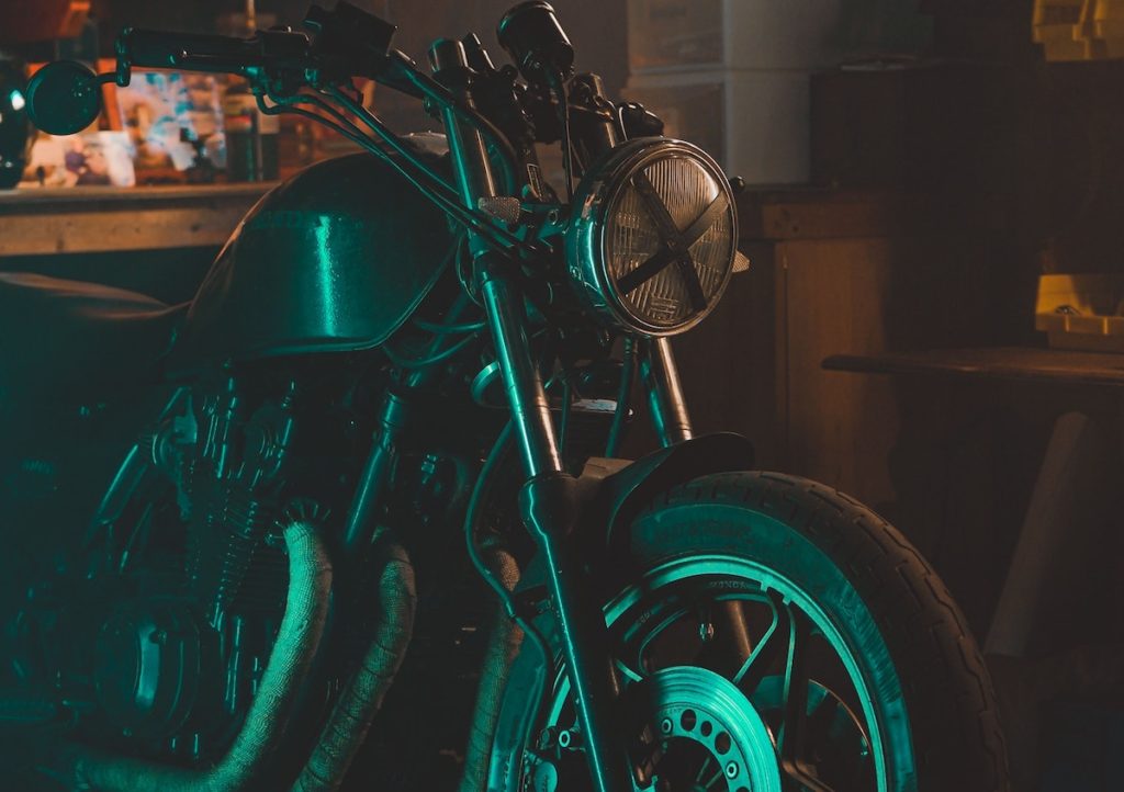 a project motorcycle in a garage