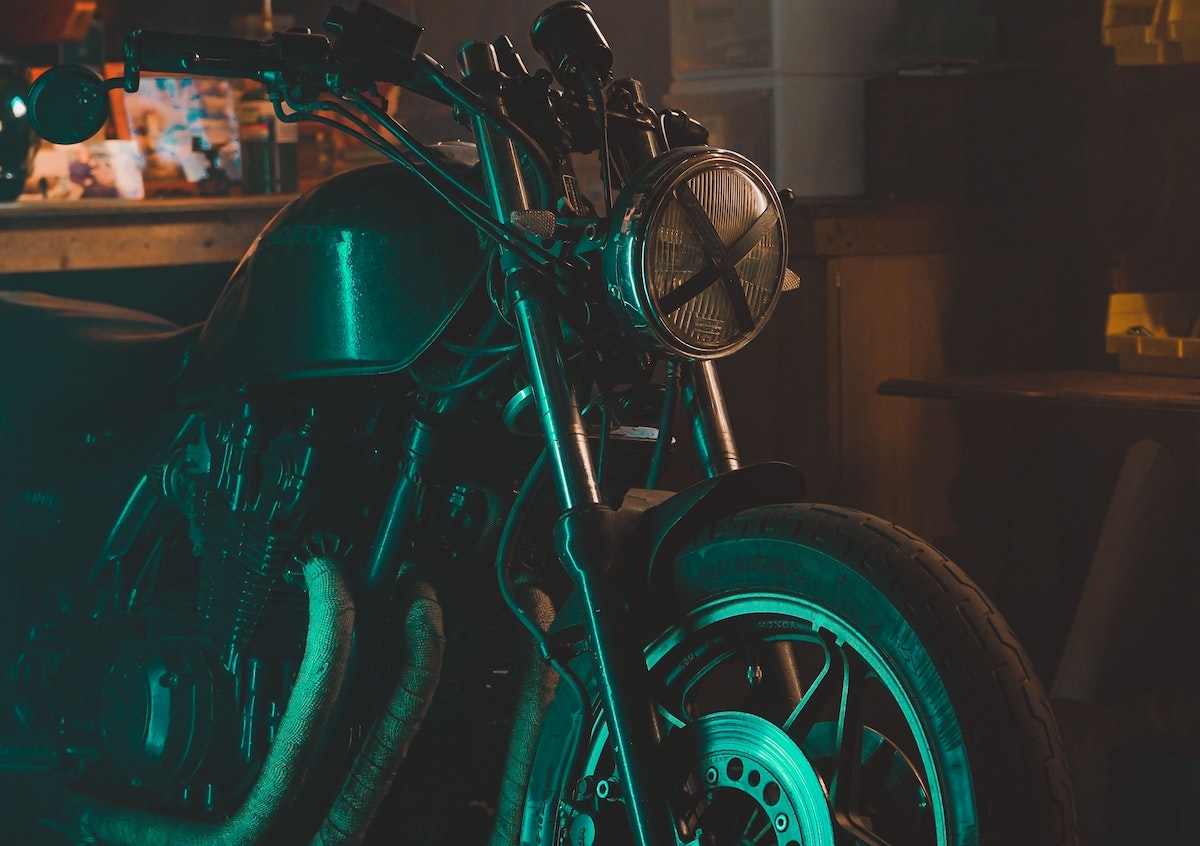 a project motorcycle in a garage