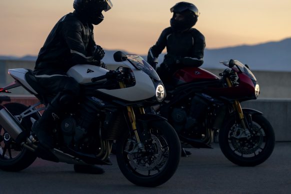2022 Triumph Speed Triple 1200 RR two different bikes parked