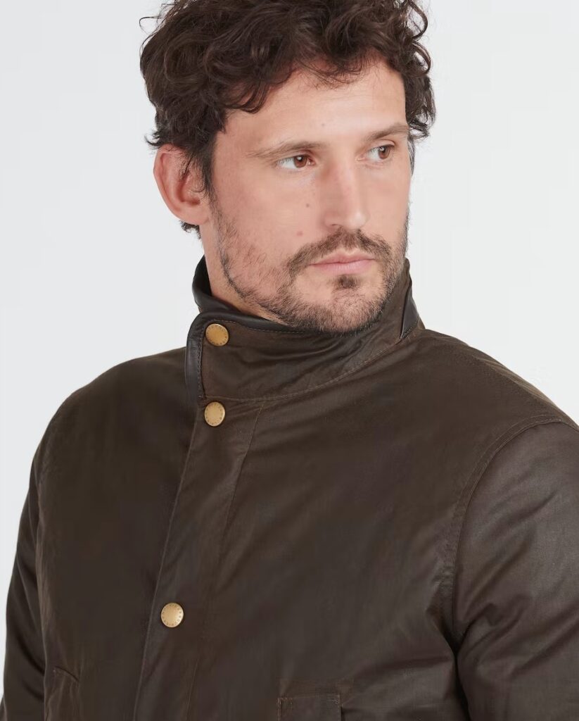 Barbour Hereford Waxed Cotton Jacket badge front close up. 