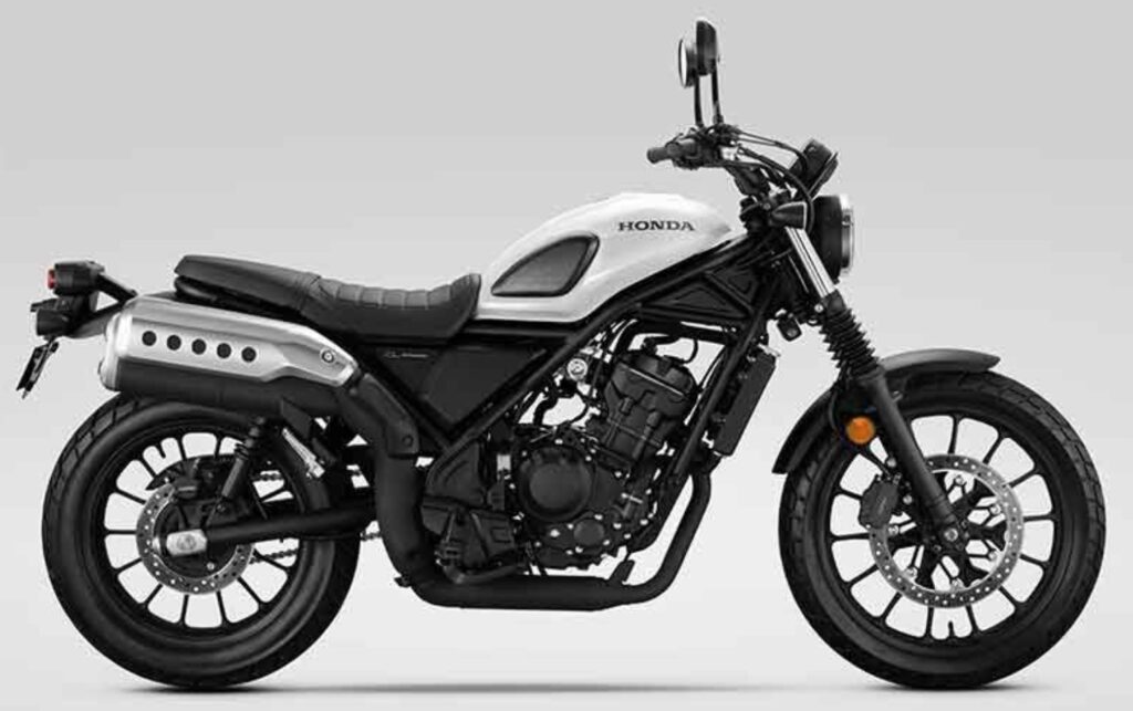 Honda CL300 scrambler motorcycle with a white tank.