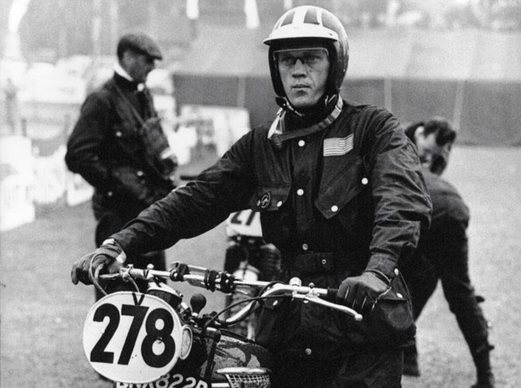 Steve McQeen riding a Triumph motorcycles bike