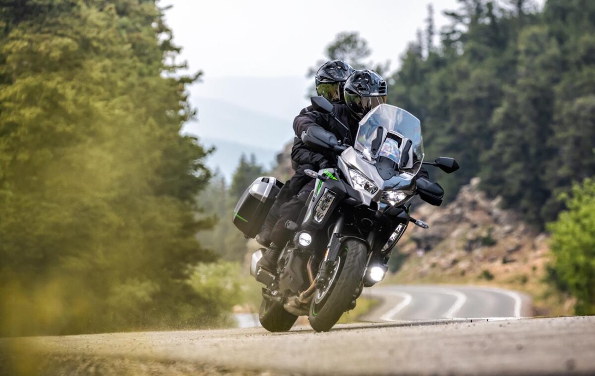 2025 Kawasaki Versys 1100 on a twisty road.