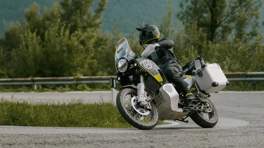 2025 Husqvarna Norden 901 Expedition riding on a twisty road