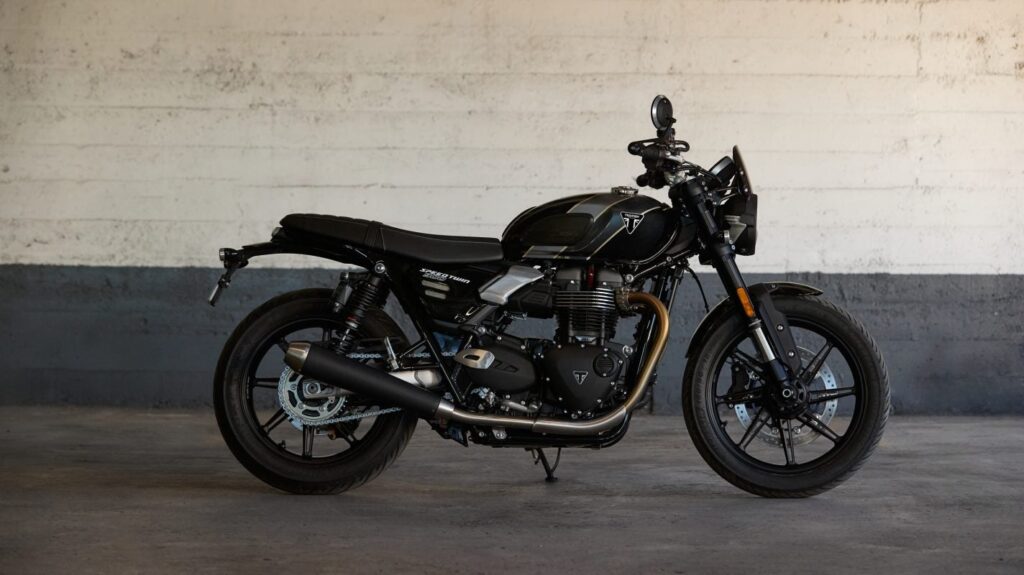 The new 2025 Triumph speed Twin 900 parked in a garage.