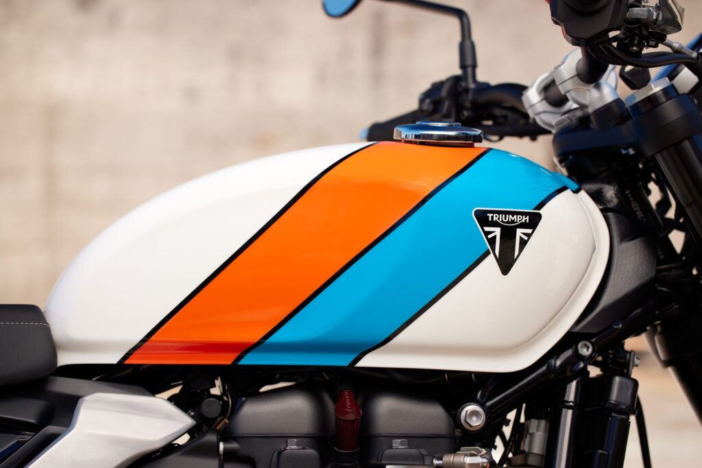 2025 Triumph speed twin gas tank in a three tone color scheme.