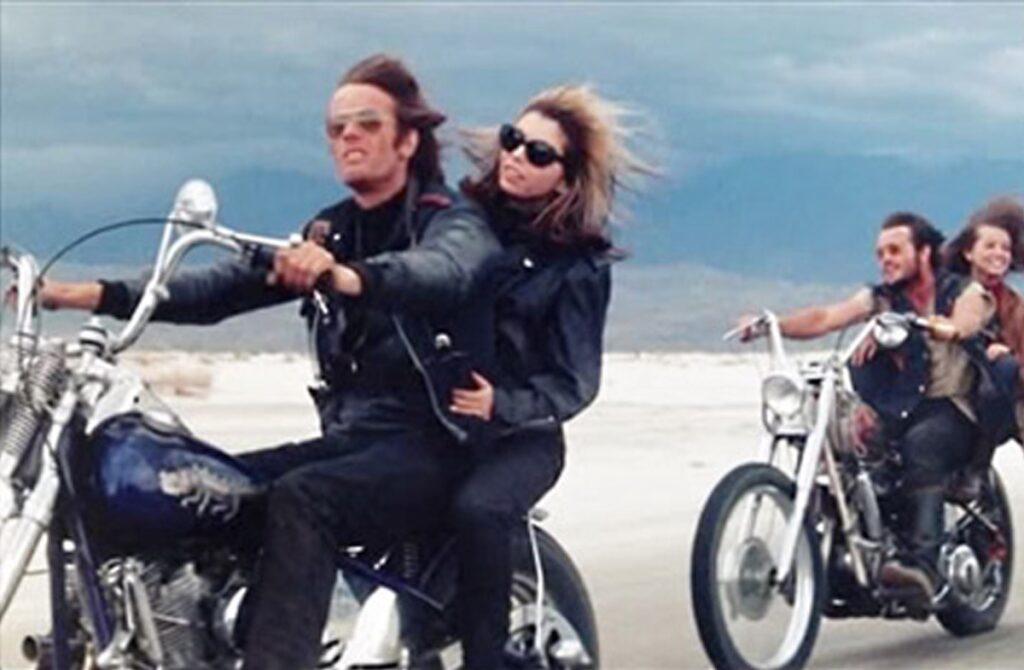 Peter Fonda and Nancy Sinatra ride on a Harley-Davidson motorcycle in The Wild Angels