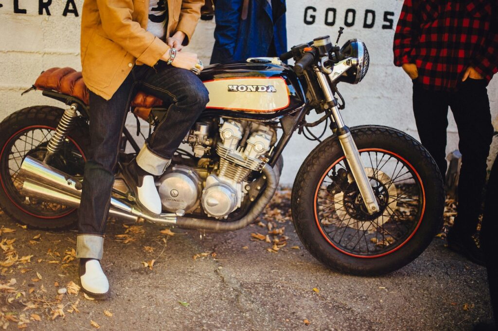 a cafe racer with an exhaust wrap on it.