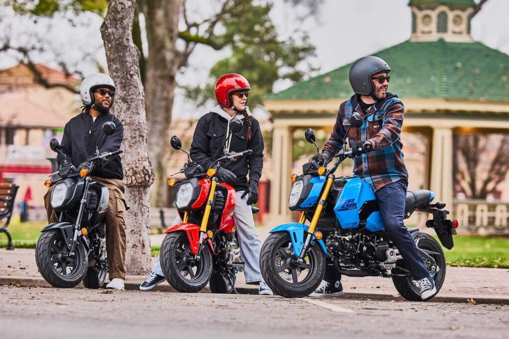 Three riders on three different Honda Grom motorcycles