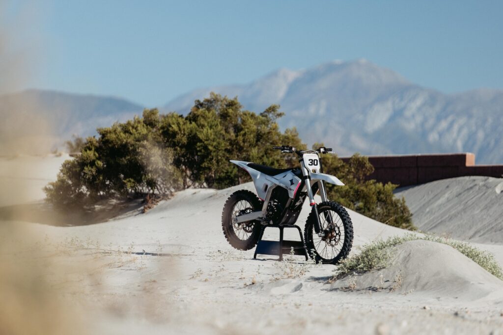 The Dust Moto Hightail parked in the desert