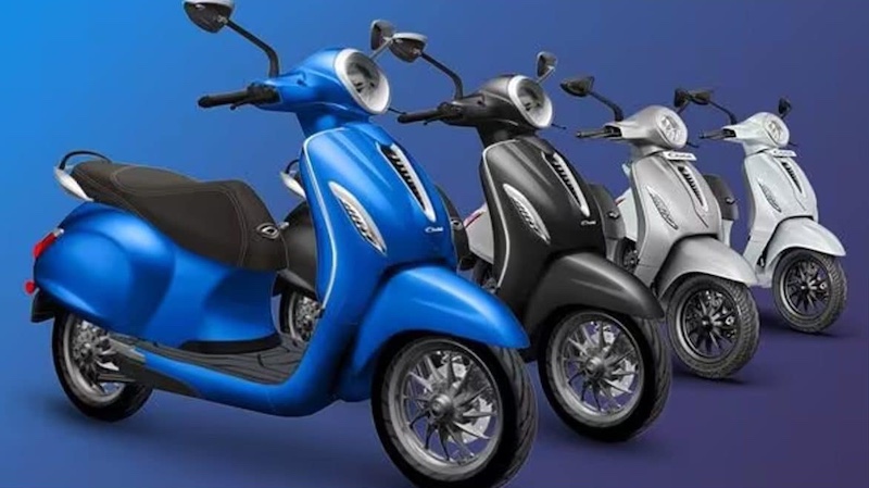 Bajaj scooters parked in a line