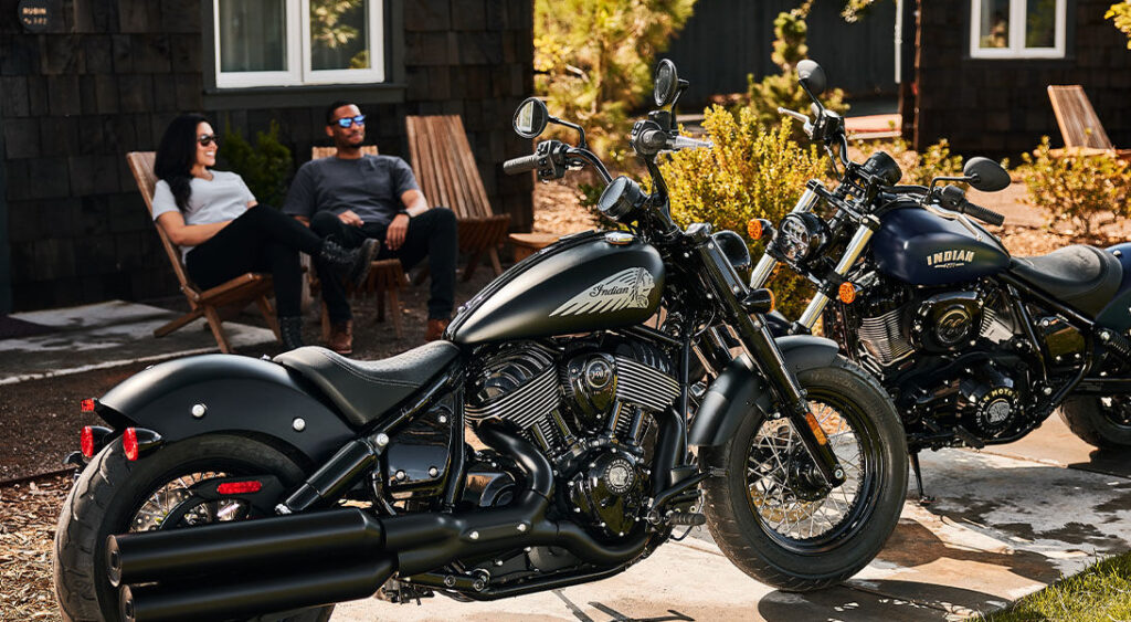 Indian Chief parked outside a house