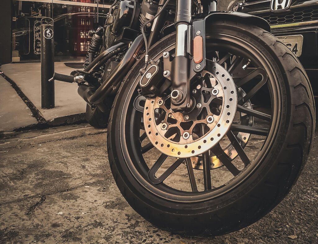 A front motorcycle tire on a cruiser style motorcycle