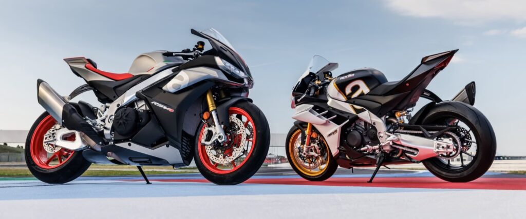 Two Aprilia RSV4 motorcycles parked next to each other