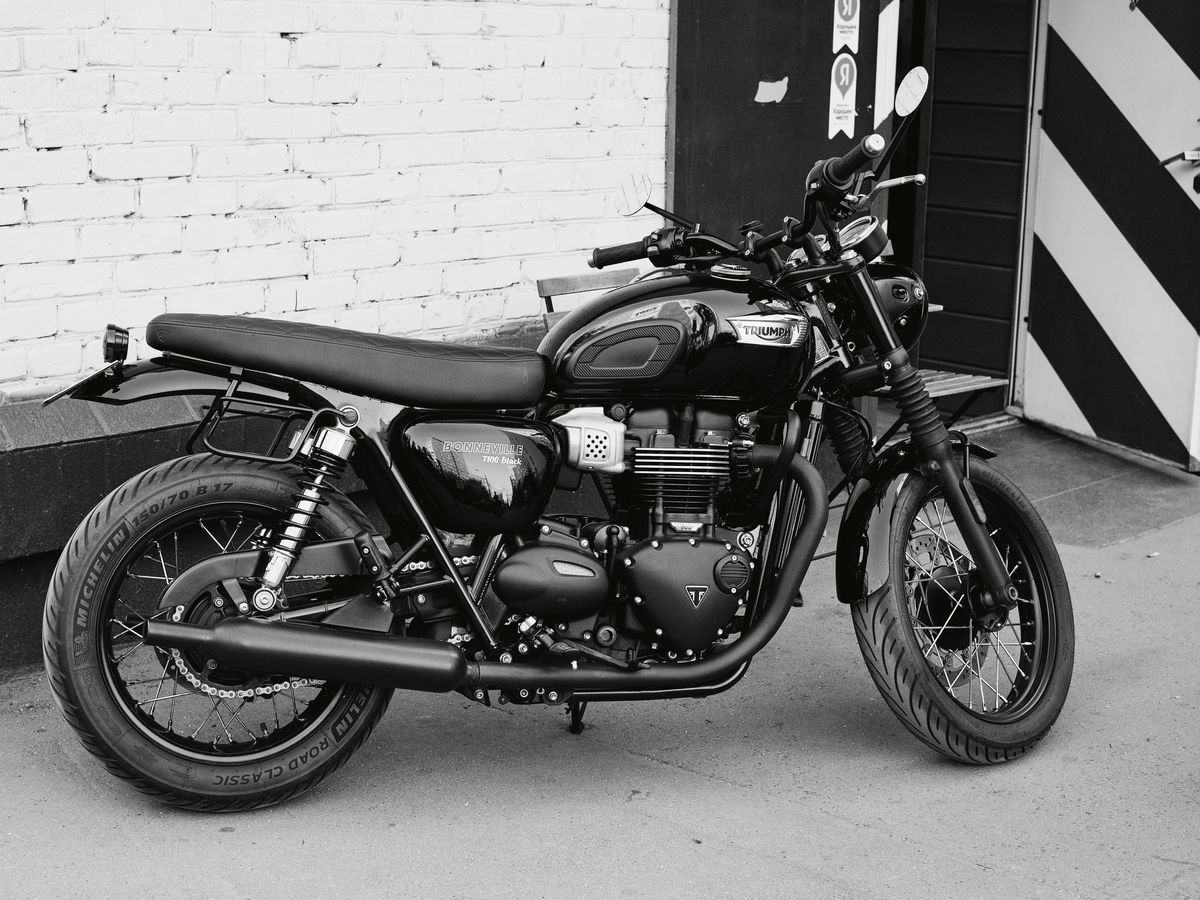 a black and white photo of a motorcycle