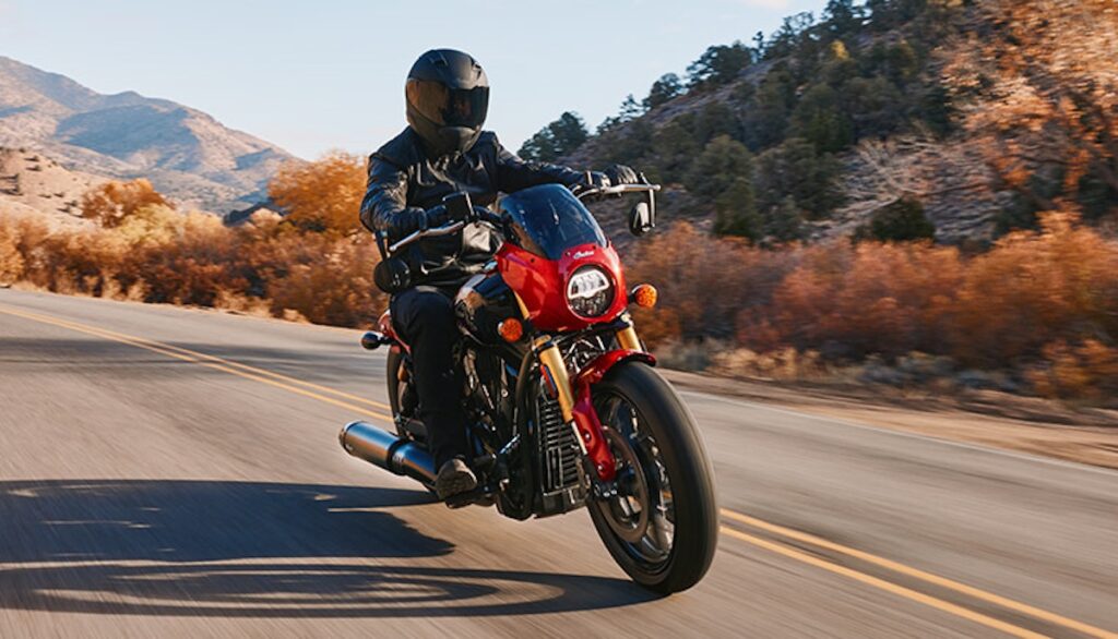 2025 Indian 101 Scout riding on a highway